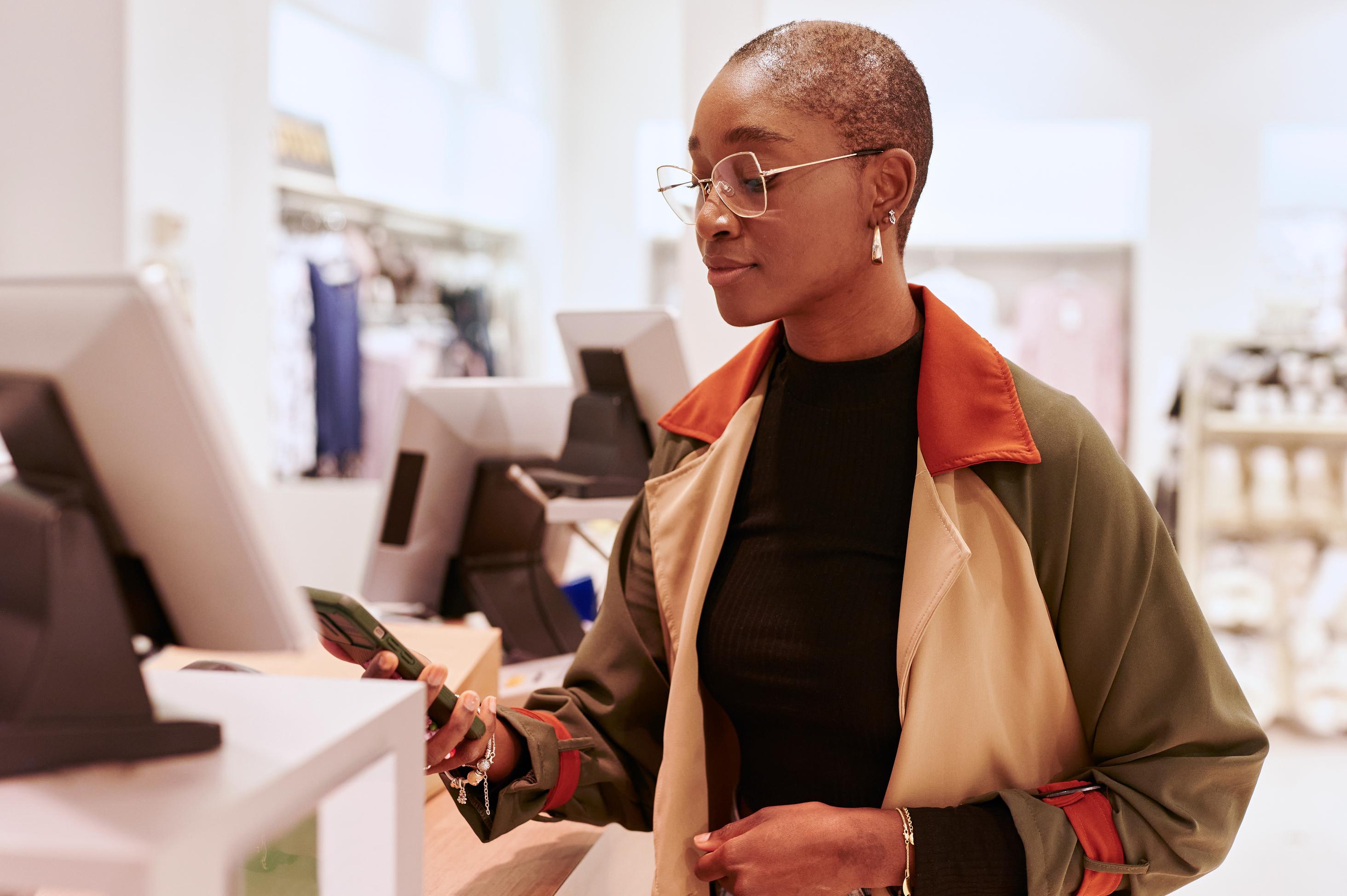 Woman Paying at Retail